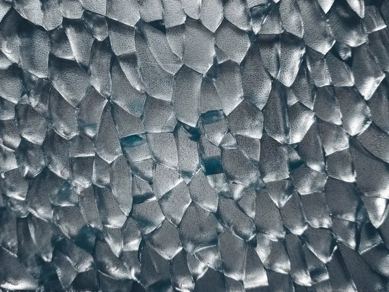 Pale crystal facets, close